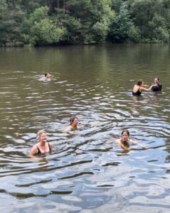 women wild swimming at NOON Wasing retreat