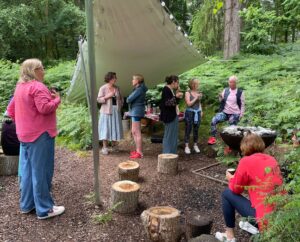 group of women at NOON Wasing retreat eating lunch al fresco