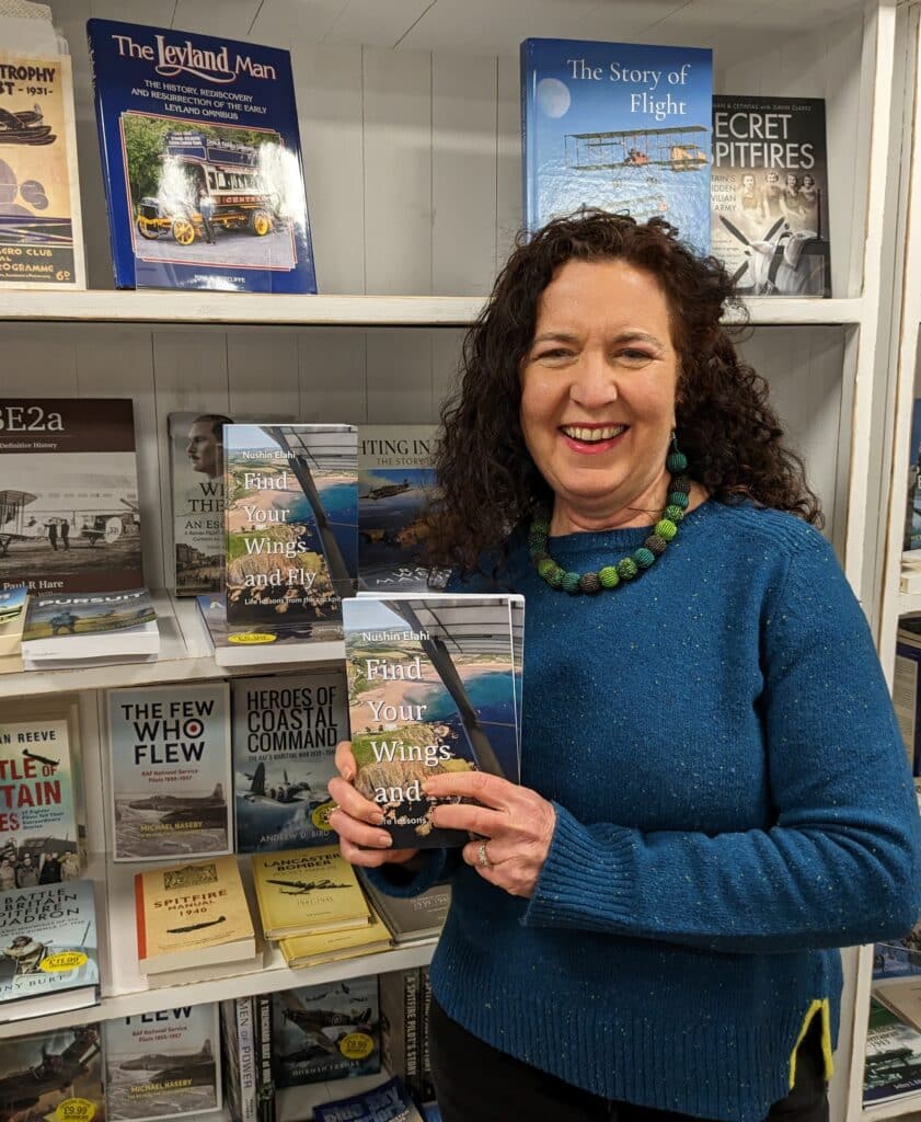Nushin Elahi with her book