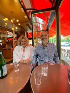 Eleanor Mills and husband in a Paris cafe